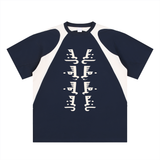 front of a Navy blue T-shirt with an islamic quote in urdu